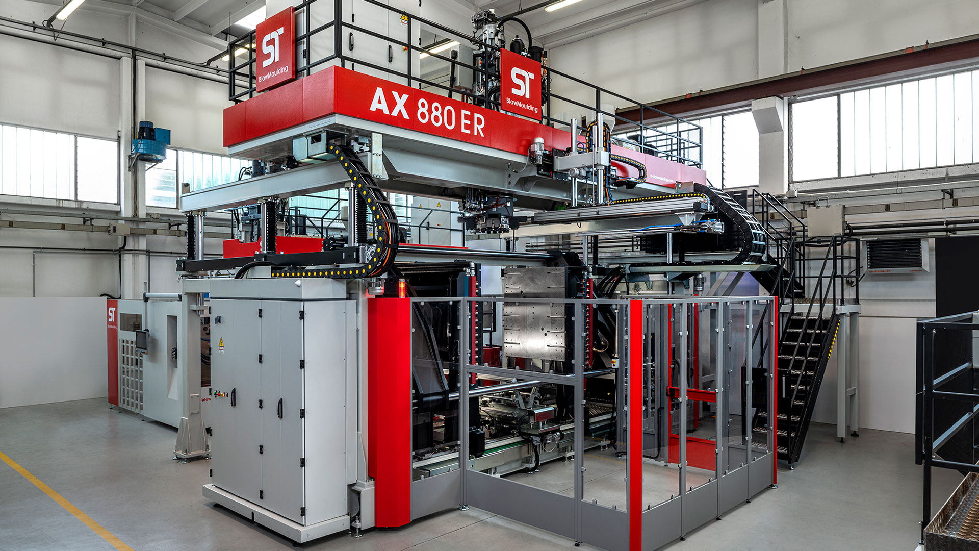 Accumulator-Head Extrusion Blow-Molding Machines - AX Series